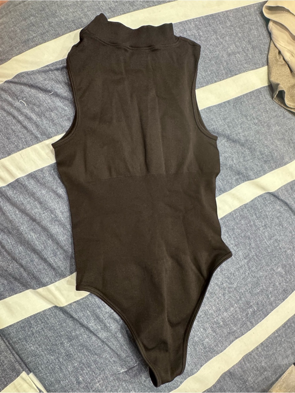 Black Sleeveless Mock Neck Bodysuit - Sleek Everyday Layering